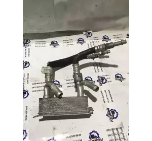 Оливний (масляний) радіатор Ford Fusion з 2012-год DG93-7A095-AD Оливний (масляний) радіатор Ford Fusion з 2012-год DG93-7A095-AD